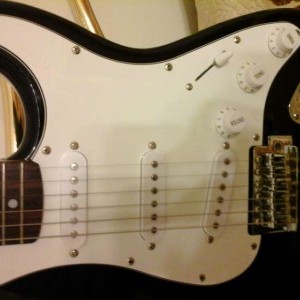 chitarra elettrica + amplificatore con accessori