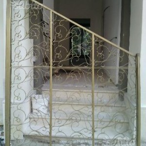 porta parete multifunzionale in ferro battuto